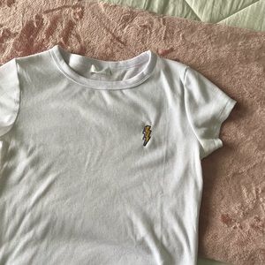 white ribbed top with thunder bolt- size medium